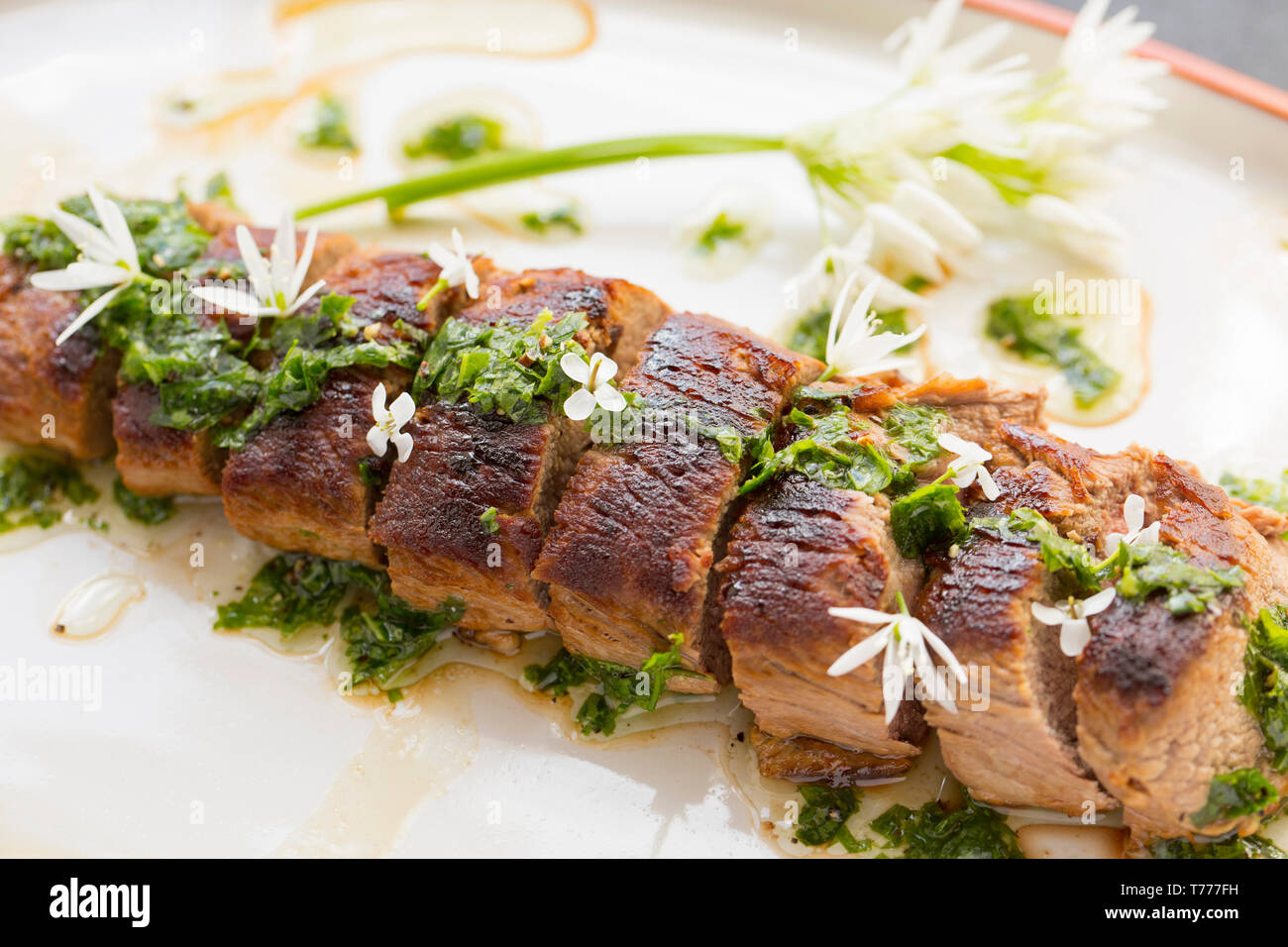 A saddle fillet from from a roe deer, Capreolus capreolus, that has been fried in olive oil and