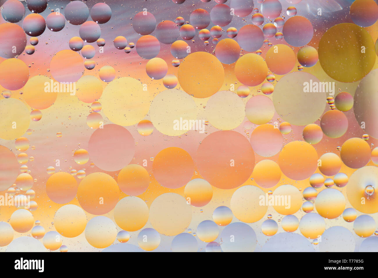 Oil drops in water -  colorful abstract background Stock Photo