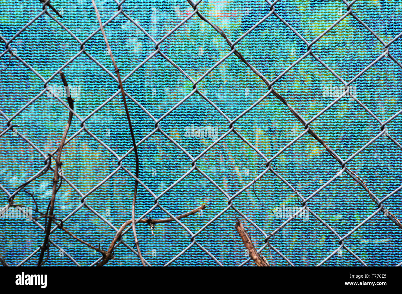 Self-Isolation chain link wire fence background image Stock Photo