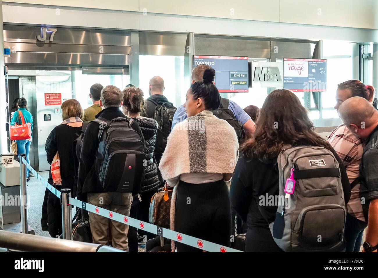 Passengers Line Up Airport Gate High Resolution Stock Photography and ...