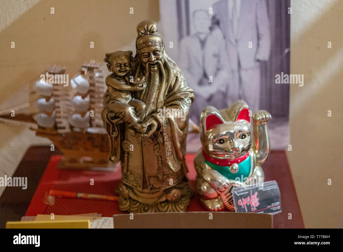 MEXICALI, MEXICO - April 8 Chinese lucky charms  decorate the basement  of a watch shop basement downtown Mexicali  April 8, 2019 in Mexicali, Mexico. Stock Photo