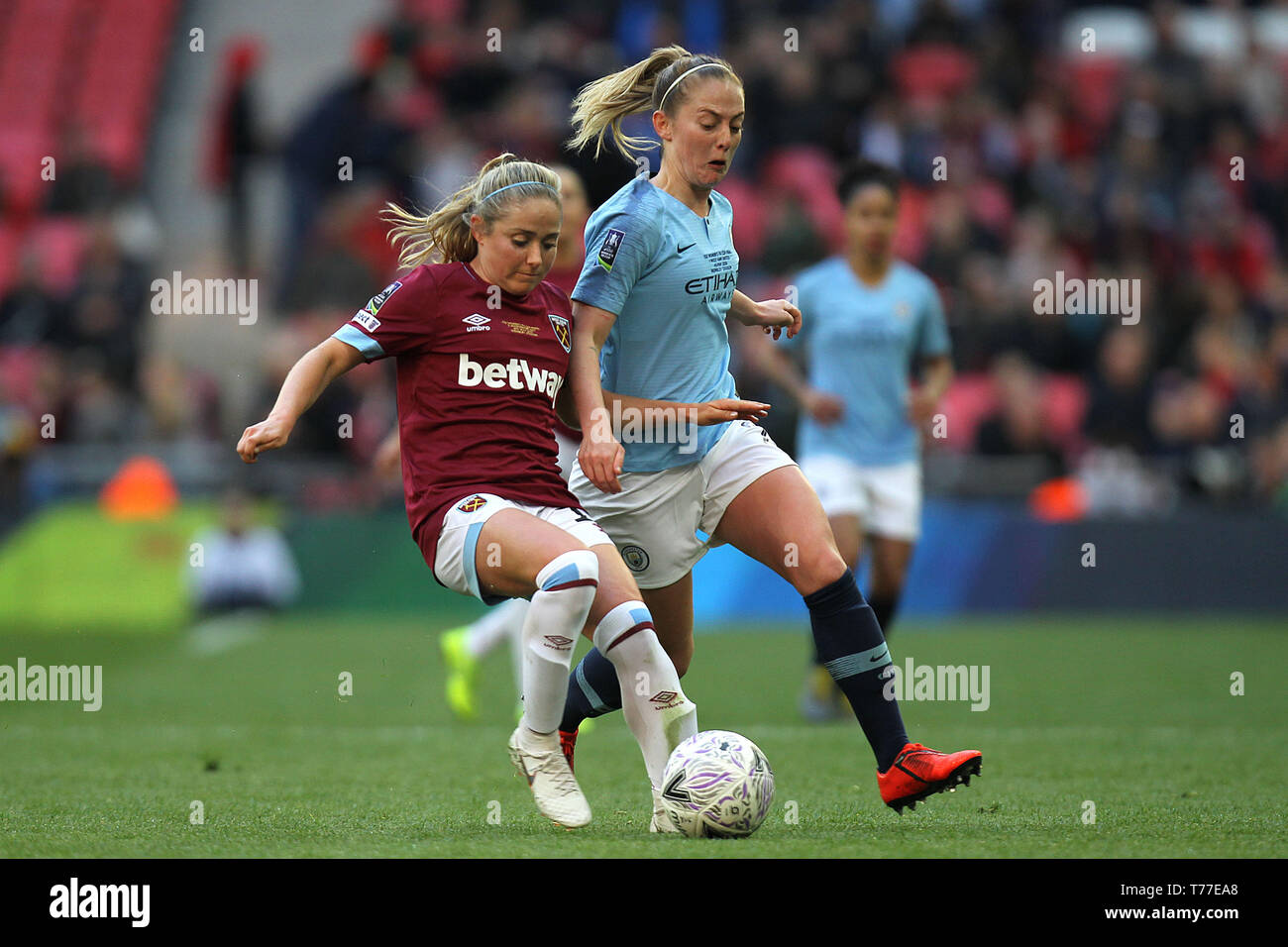 London, UK. 04th May, 2019. Brianna Visalli of West Ham Unitedand Keira Walsh of Manchester City during the FA Women's Cup Final match between Manchester City Women and West Ham United Ladies at Wembley Stadium on May 4th 2019 in London, England. Credit: PHC Images/Alamy Live News Stock Photo