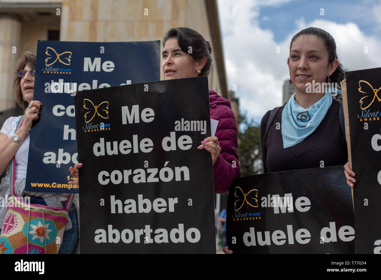 Bogota, Colombia. 04th May, 2019. Participants hold signs against abortion during the ''Unidos por la vida'' (United for Life) Pro life rally in Bogota. Under the slogan ''I choose the two lives'' around 500 people demonstrated for the maintenance of traditional family values, against abortion and the killing of social leaders in the country. Catholic and right wing political groups joined the call of the ''United for Life'' Platform (Unidos por la Vida) a widely spread organization in Colombia. Credit: ZUMA Press, Inc./Alamy Live News Stock Photo