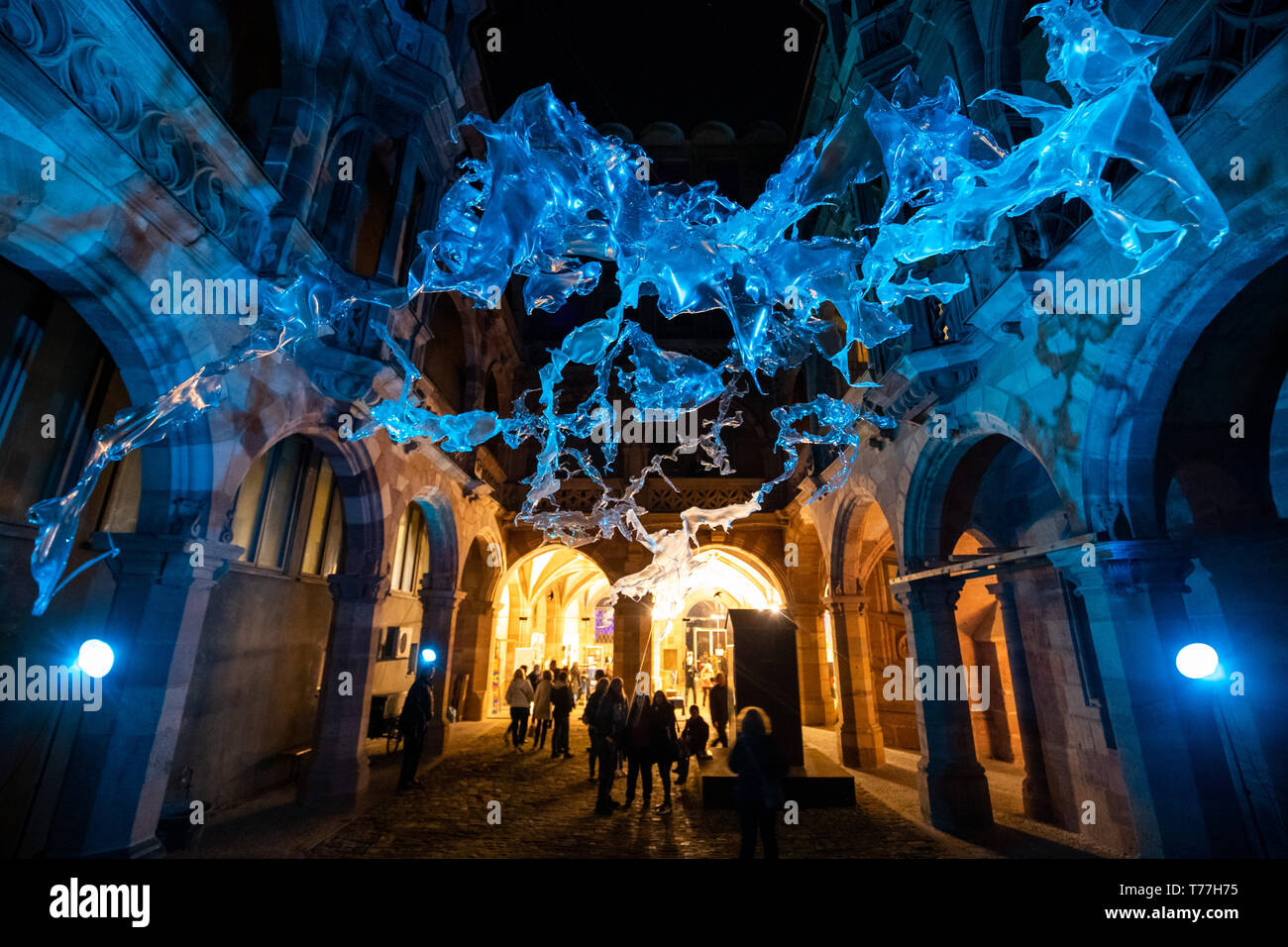 Nuremberg, Germany. 04th May, 2019. The room installation 'Biofacts related culture is a superior nature' by the artist Aljoscha from Düsseldorf hangs during the 'Blue Night' in the courtyard of the Pellerhaus. Under this year's motto 'Heaven and Hell' the 20th Night of Art and Culture took place in Nuremberg's Old Town. Credit: Daniel Karmann/dpa/Alamy Live News Stock Photo