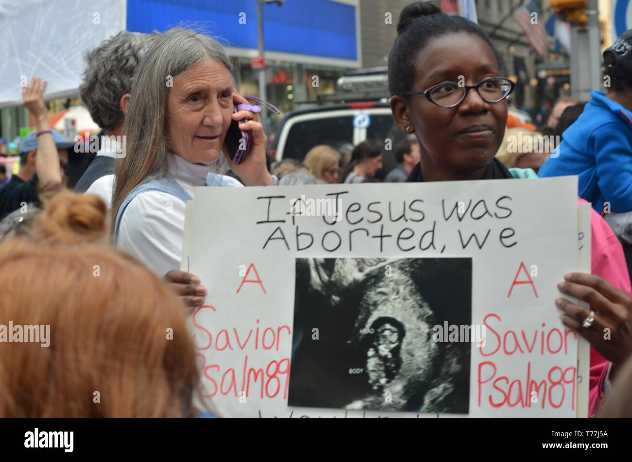 New York, USA. 4th May, 2019. A Participant seen holding a placard during the Abortion rally at the Times Square in New York.People gathered in Times Square to protest against abortion law in New York State, the law legalizes late term abortion until the moment of birth. During the demonstration a doctor performed a live 4D ultrasound showing an unborn baby in the womb & callousness of late term abortion. Credit: Ryan Rahman/SOPA Images/ZUMA Wire/Alamy Live News Stock Photo