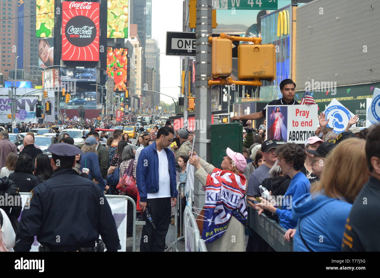 New York, USA. 4th May, 2019. A man seen holding a placard during the Abortion rally at the the Times Square in New York.People gathered in Times Square to protest against abortion law in New York State, the law legalizes late term abortion until the moment of birth. During the demonstration a doctor performed a live 4D ultrasound showing an unborn baby in the womb & callousness of late term abortion. Credit: Ryan Rahman/SOPA Images/ZUMA Wire/Alamy Live News Stock Photo