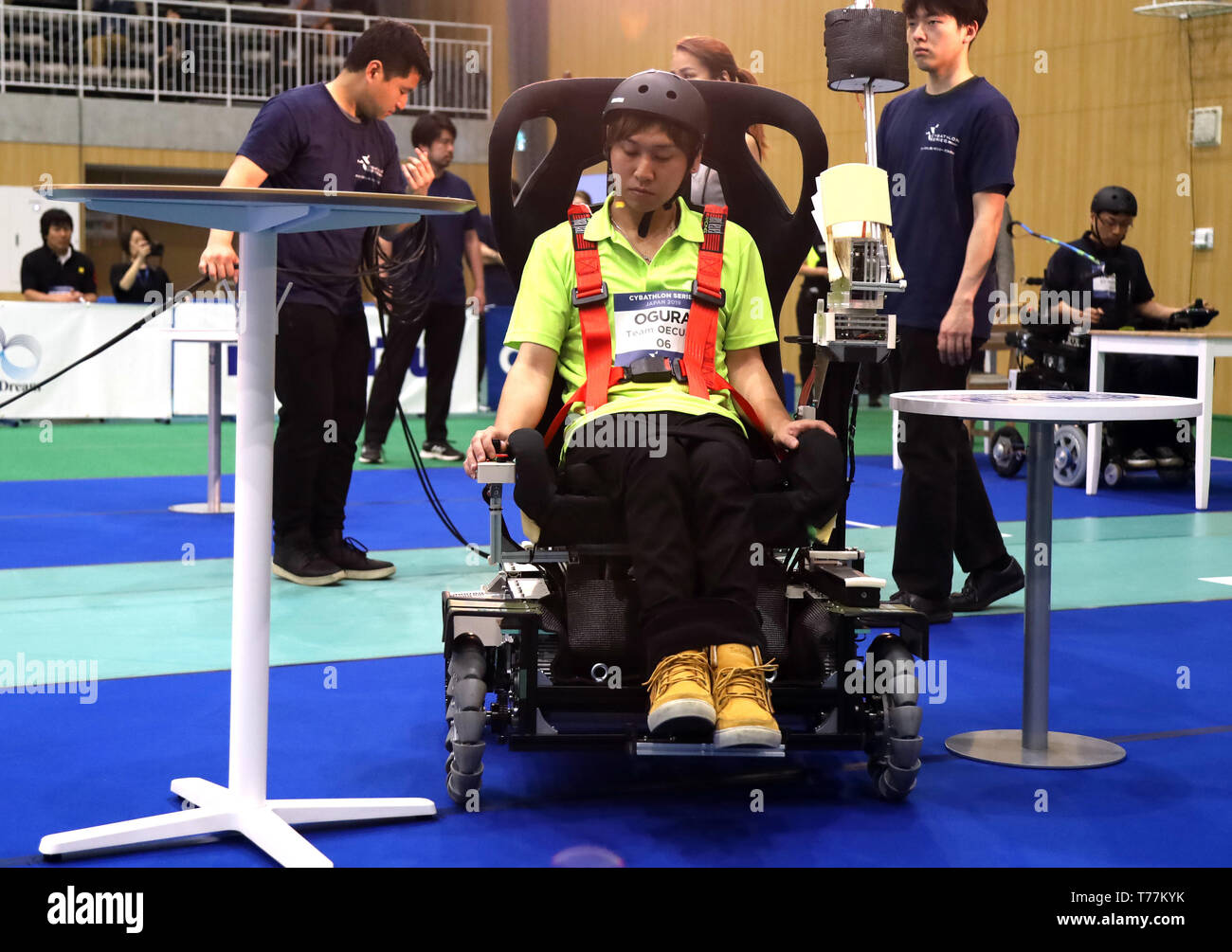 Kawasaki, Japan. 5th May, 2019. Japanese pilot Florian Toshiki Ogura of Osaka Electro-Communication University team drives a special electric powered wheelchair to go through a narrow space between tables to clear a task for the Cybathlon Powered Wheelchair Race in Kawasaki, suburban Tokyo on Sunday, May 5, 2019. Eight teams from Russia, Switzerland, Hong Kong and Japan competed a smart wheelchair race with walking disability pilots. Credit: Yoshio Tsunoda/AFLO/Alamy Live News Stock Photo