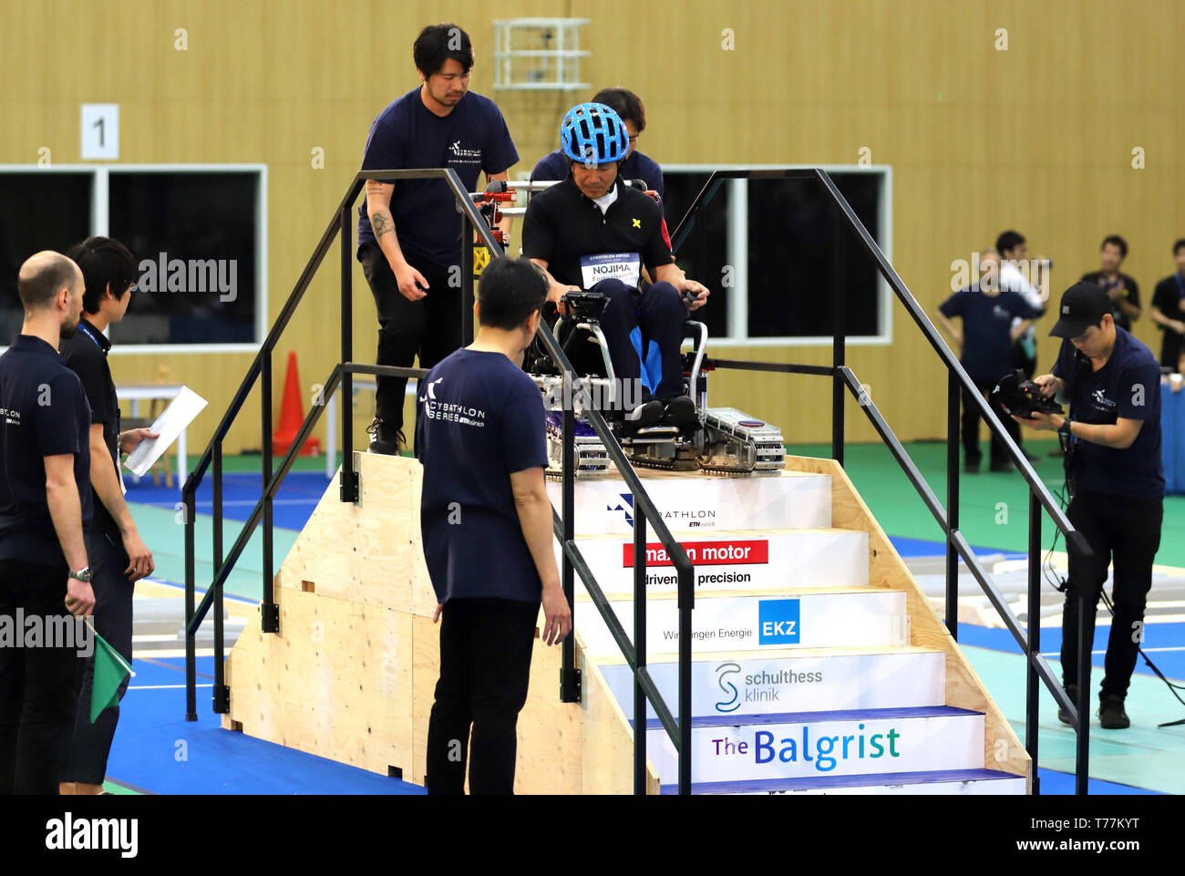 Kawasaki, Japan. 5th May, 2019. Japanese pilot Hiroshi Nojima of Keio University team drives a special electric powered wheelchair to go down steps to clear a task for the Cybathlon Powered Wheelchair Race in Kawasaki, suburban Tokyo on Sunday, May 5, 2019. Eight teams from Russia, Switzerland, Hong Kong and Japan competed a smart wheelchair race with walking disability pilots. Credit: Yoshio Tsunoda/AFLO/Alamy Live News Stock Photo