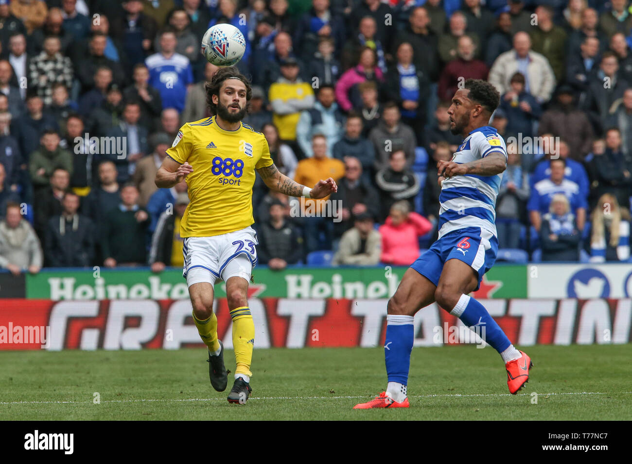 Reading, UK. 05th May, 2019. Sky Bet Championship, Reading vs Birmingham City ; Liam Moore (06) of Reading clears the ball ahead of Jota (23) of Birmingham Credit: Matt O'Connor/News Images, English Football League images are subject to DataCo Licence Credit: News Images /Alamy Live News Stock Photo