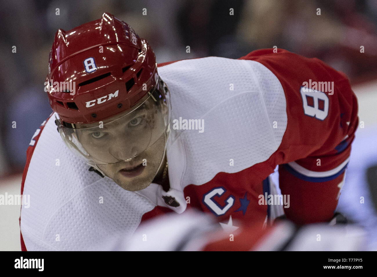 Washington, DC, USA. 26th Mar, 2019. Washington Capitals left wing Alex Ovechkin (8) looks on during a stoppage in play as the Carolina Hurricanes play the Washington Capitals at Capital One Arena in Washington, DC on March 26, 2019. The Capitals lead the Metropolitan Division and can clinch a Stanley Cup Playoff position tonight. Credit: Alex Edelman/ZUMA Wire/Alamy Live News Stock Photo