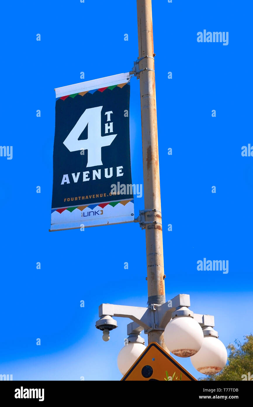 4th Avenue banner hanging overhead from a light pole in Tucson AZ Stock Photo Alamy