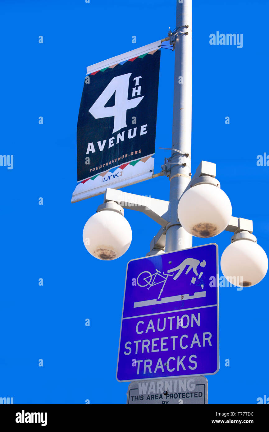 4th Avenue banner hanging overhead from a light pole in Tucson AZ Stock Photo Alamy