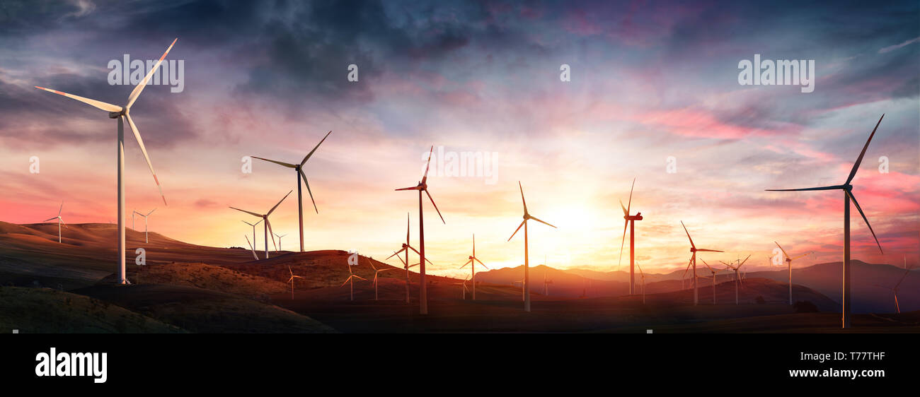 Wind Turbines In Rural Landscape At Sunset Stock Photo - Alamy