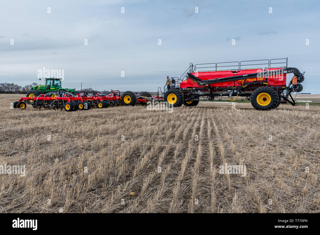 Swift Current, SK/Canada May 4, 2019 Farmer with tractor and air