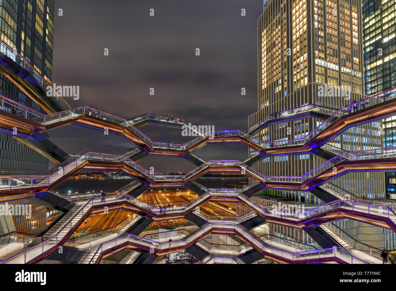 New York City - March 15, 2019: The Vessel, also known as the Hudson Yards Staircase (designed by architect Thomas Heatherwick) at dusk in Midtown Man Stock Photo
