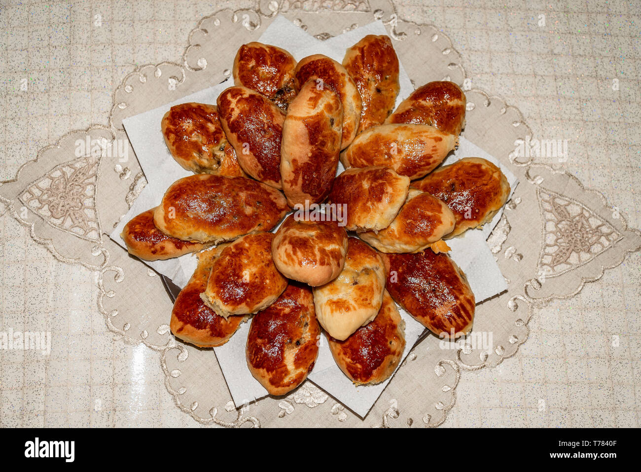 Russian pirozhki, baked patties. Stock Photo