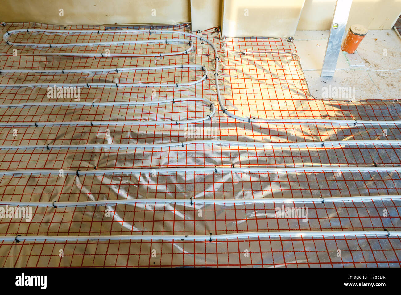 Close Up On Water Floor Heating System Interior Stock Photo