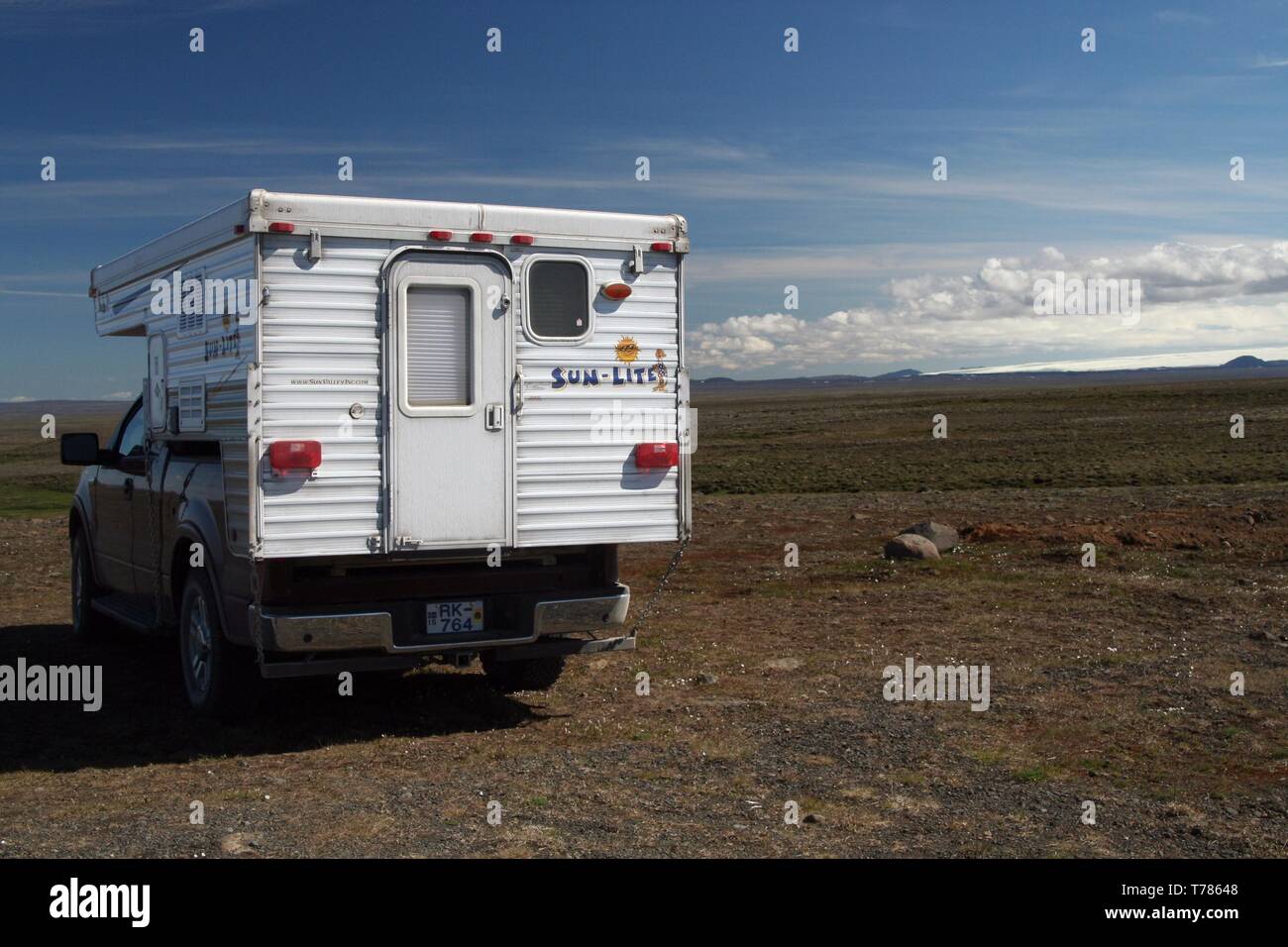 MOUNT HEKLA, ICELAND - JULY 28. 2008: Isolated camper off road in volcanic wasteland Stock Photo