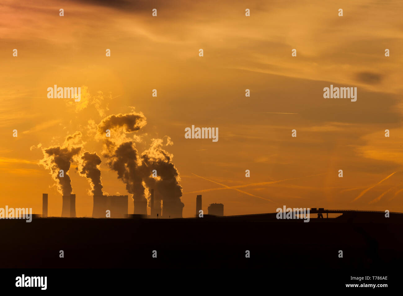 Brown coal power plant of the company RWE Power in Niederaussem at dawn Stock Photo