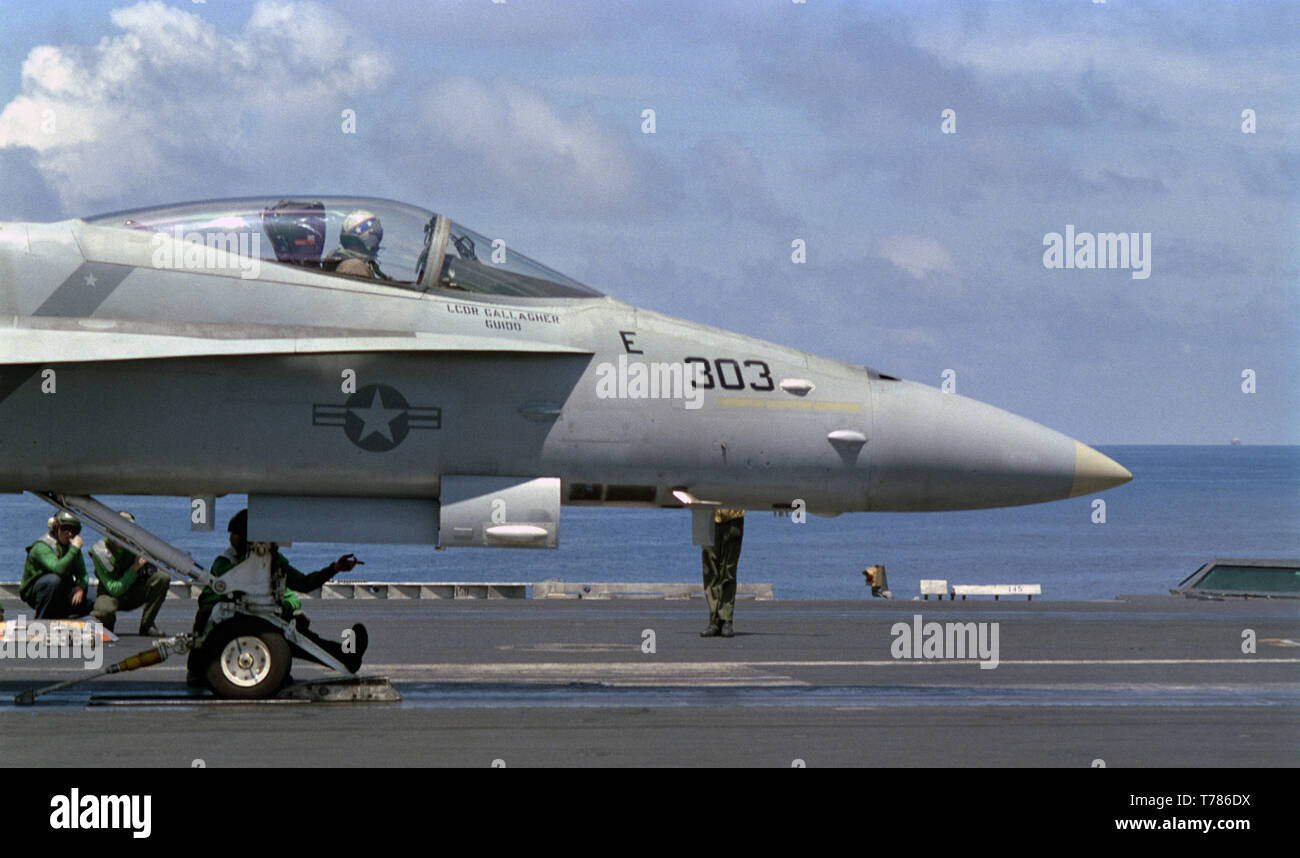 1st November 1993 Operation Continue Hope. An F/A-18 Hornet preparing for take off on the flight deck of the U.S. Navy aircraft carrier USS Abraham Lincoln in the Indian Ocean, 50 miles off Mogadishu, Somalia. Stock Photo