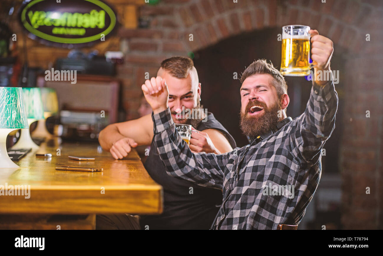 Refreshing beer concept. Men drinking beer together. Hipster brutal man ...