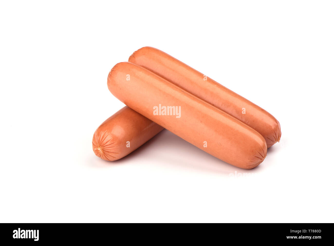 Three fresh boiled sausages isolated on white background. Copy space Stock Photo