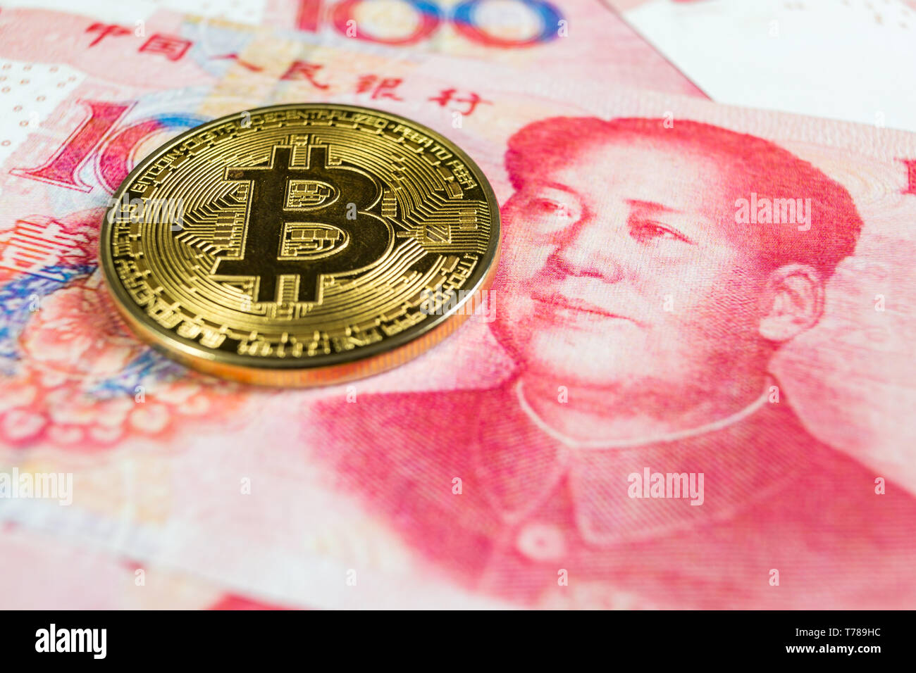 Money concept. Chinese Yuan, Bitcoin and one hundred dollars Stock Photo -  Alamy
