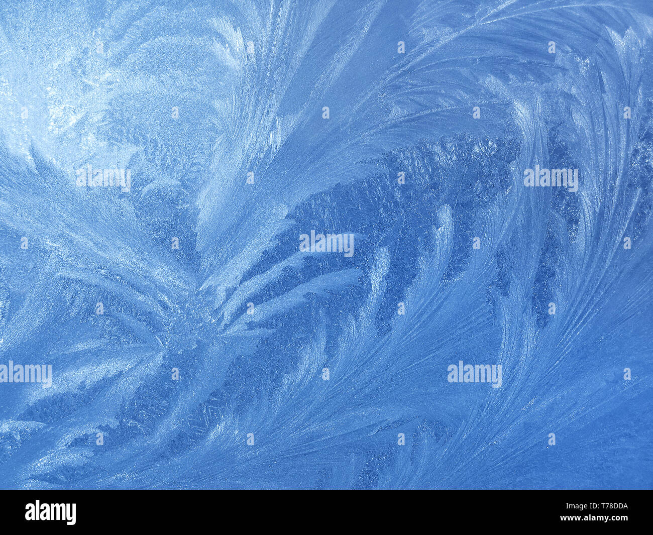 Frosty natural pattern on winter window glass Stock Photo - Alamy