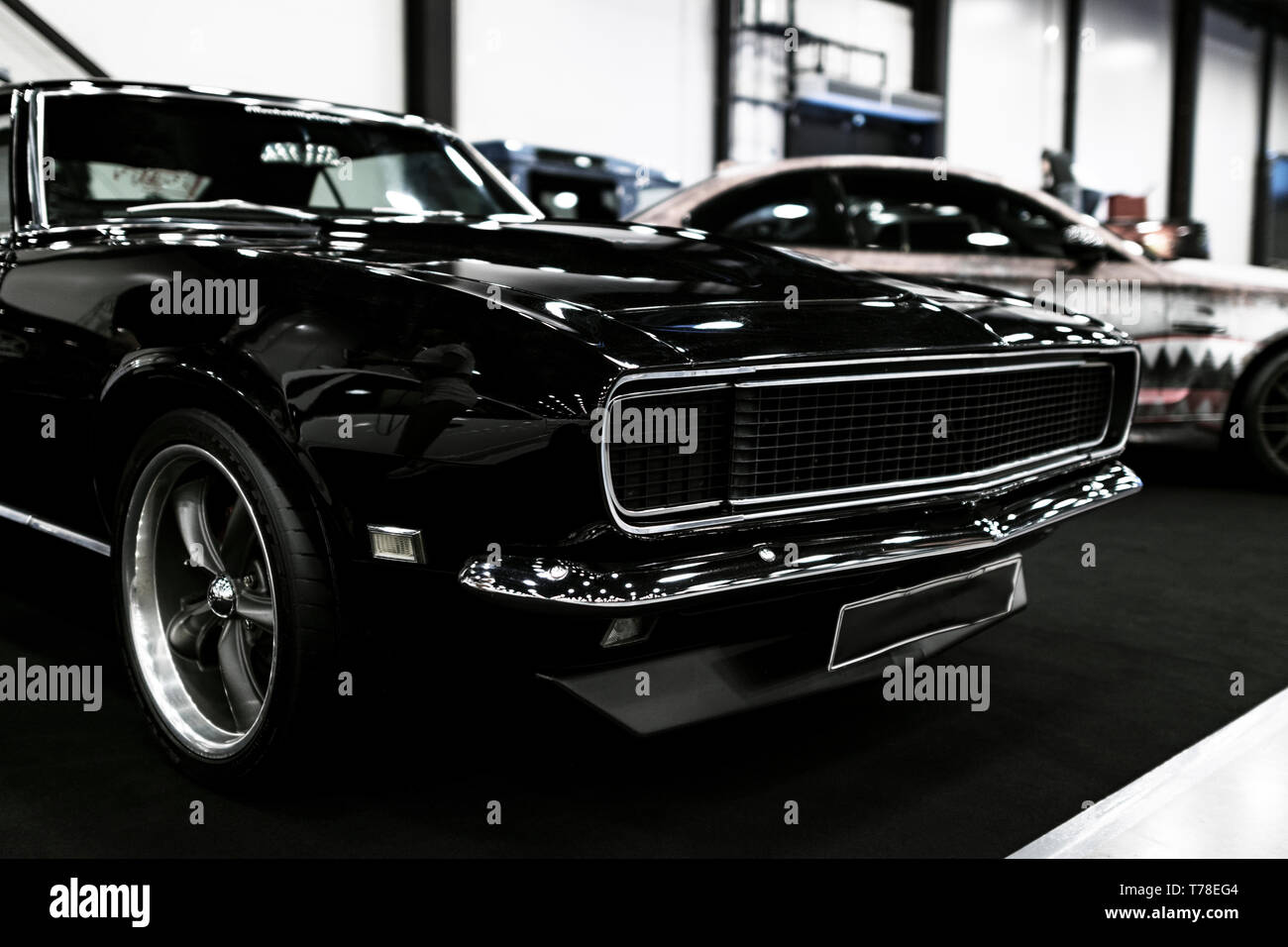 Sankt-Petersburg, Russia July 21 2017: Front view of a Black Dodge Charger RT muscle car.  Car exterior details. Photo Taken at Royal Auto Show July  Stock Photo