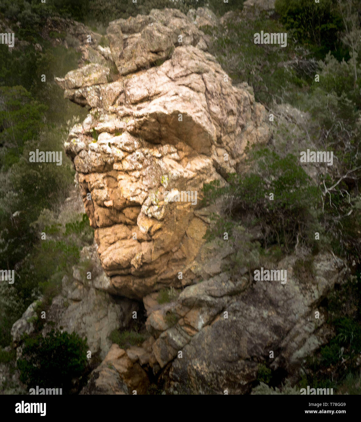 Face on the side of mountain range in Corsica Stock Photo
