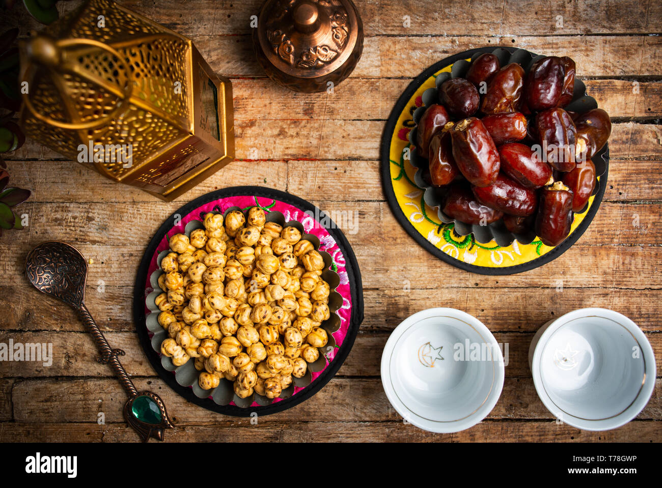 Dates and chickpeas served with Turkish coffee top view Stock Photo