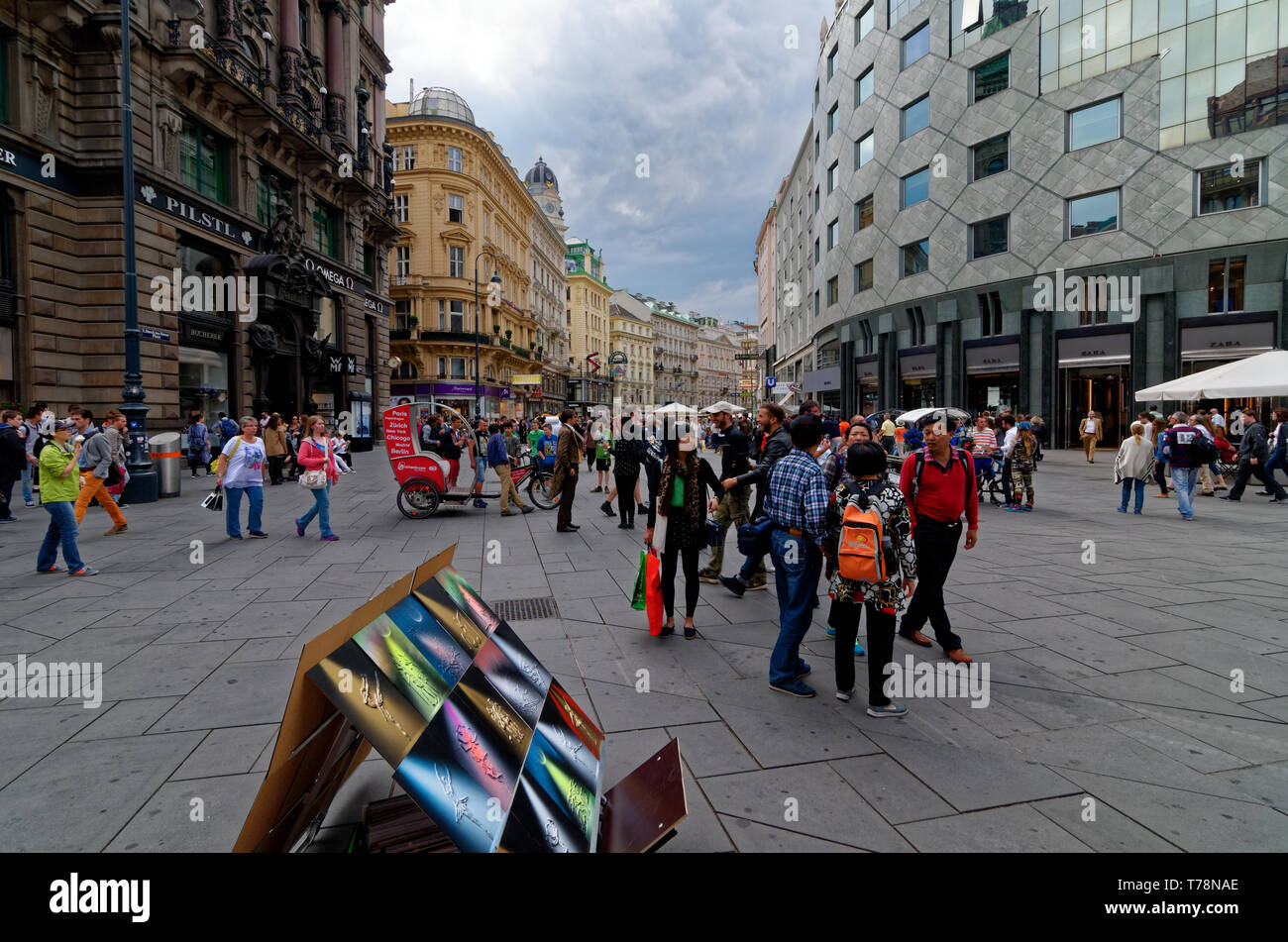Tourists walking around a bustling Stephansplatz in Vienna Old Town, Austria Stock Photo