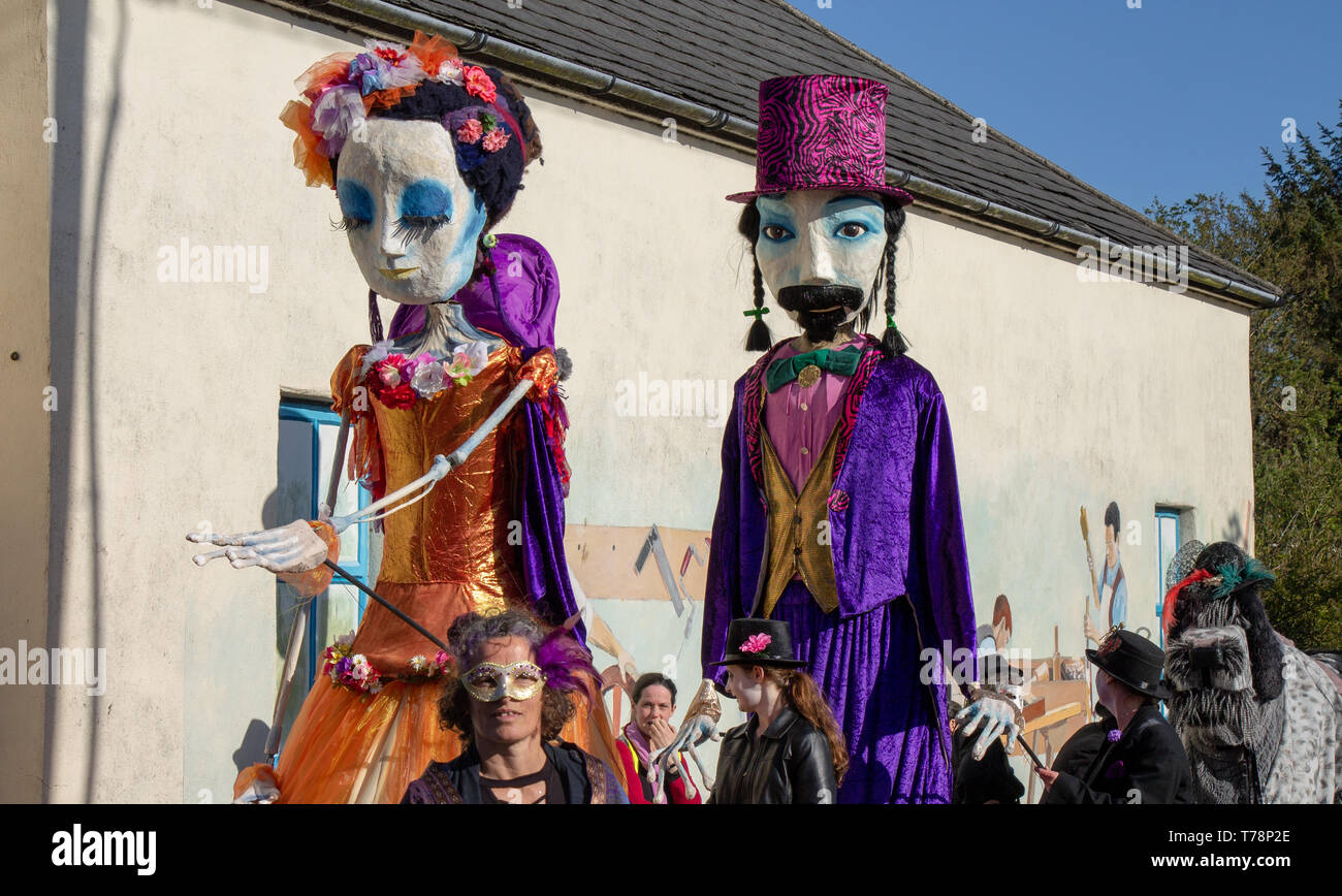close up of giant mannequin figures at a jazz festival. Stock Photo