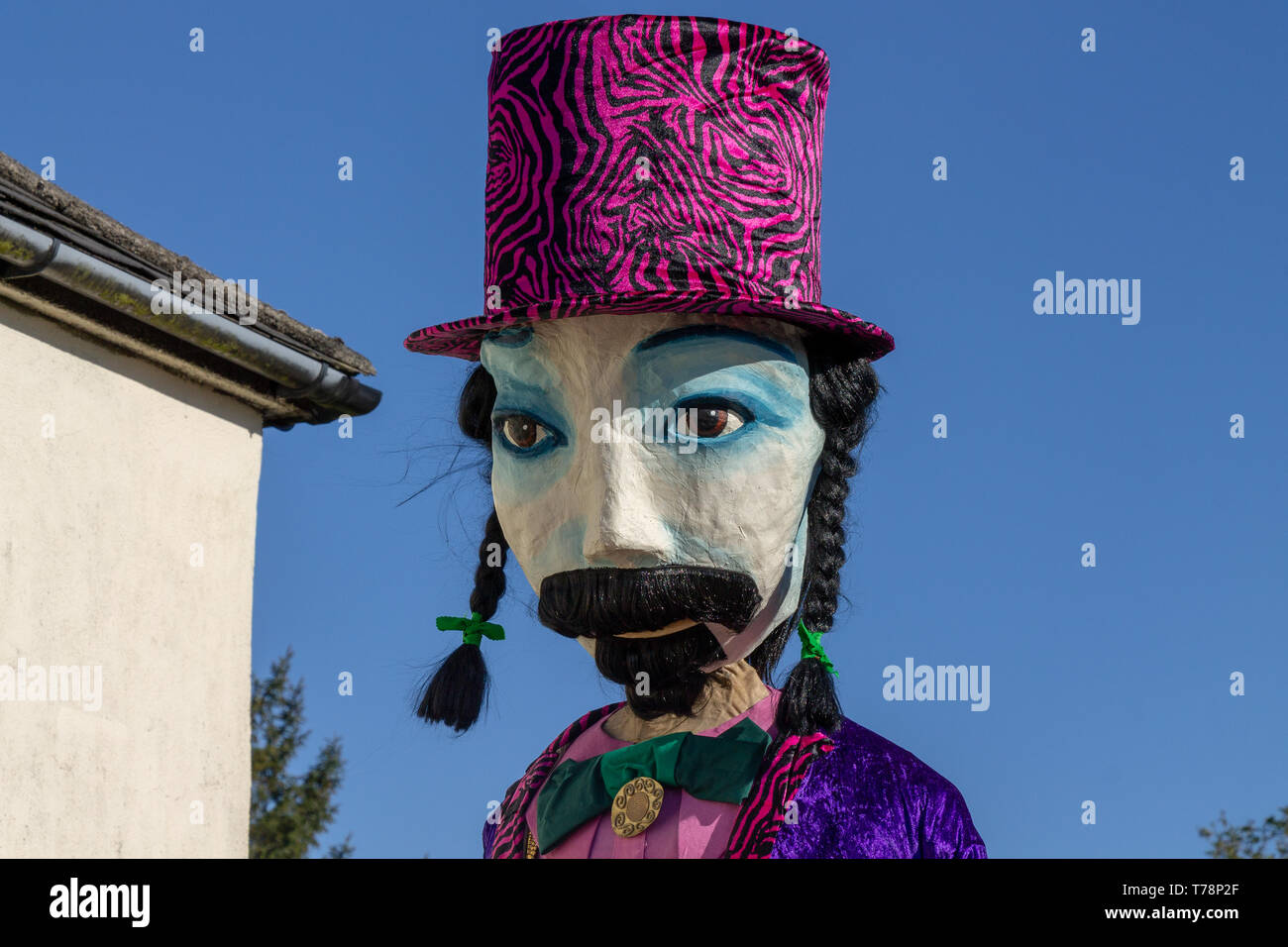 close up of giant mannequin figures at a jazz festival. Stock Photo