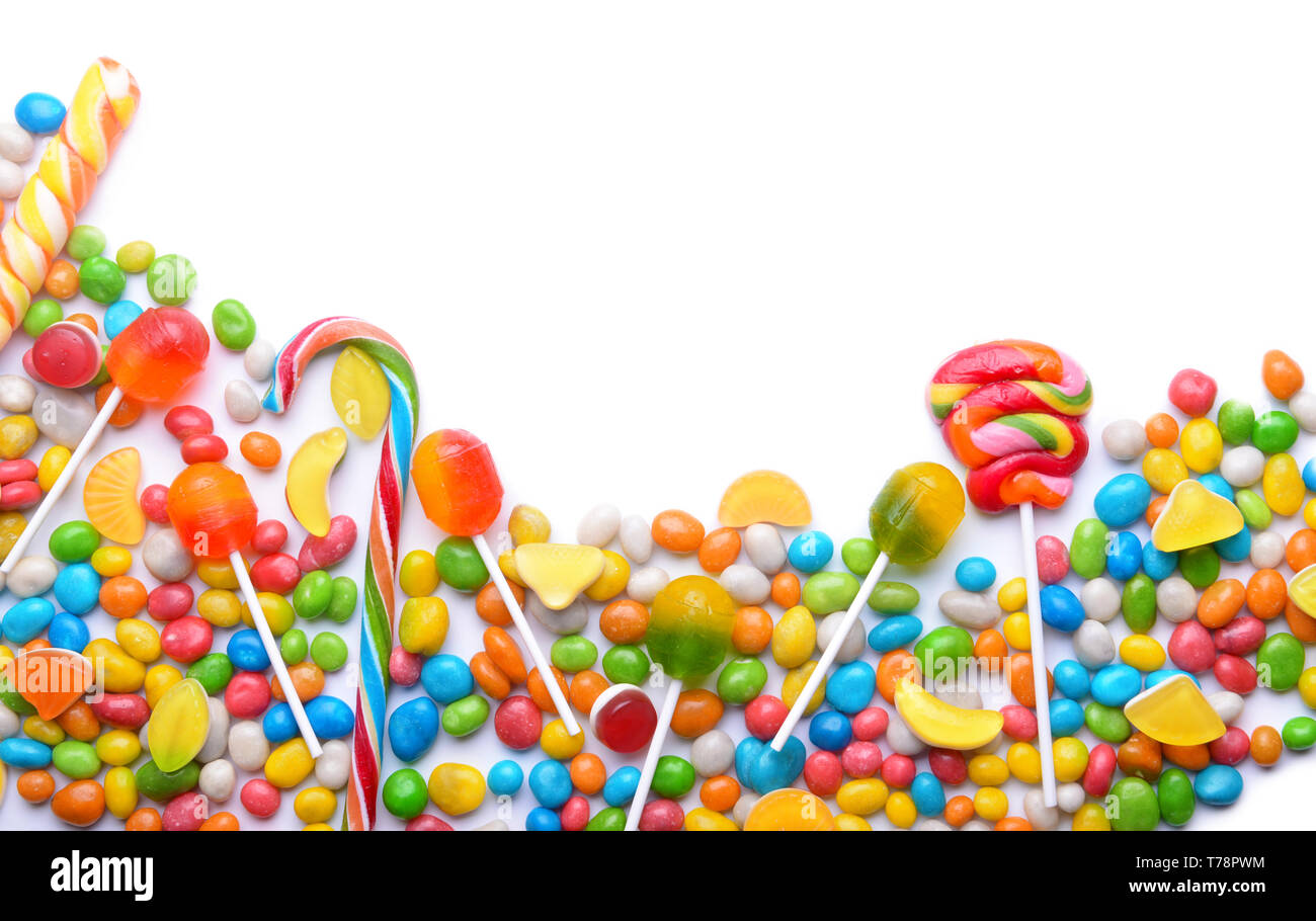 Tasty lollipops and colorful candies on white background Stock Photo ...