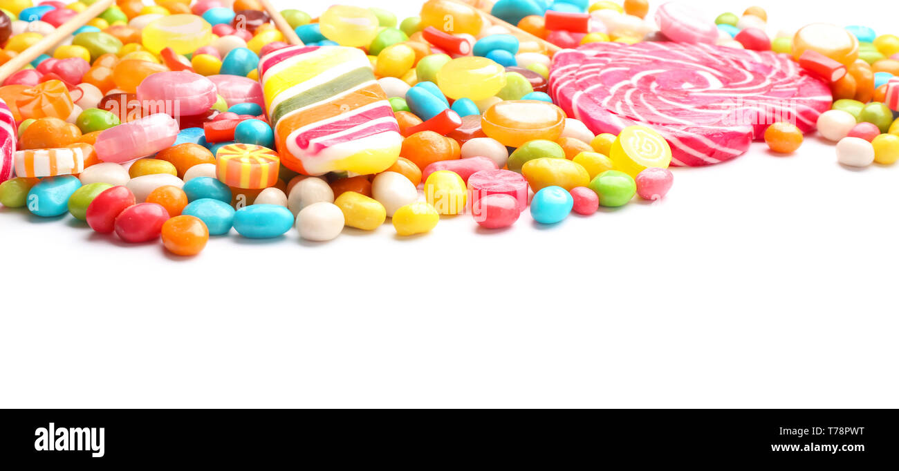 Tasty lollipops and colorful candies on white background Stock Photo ...