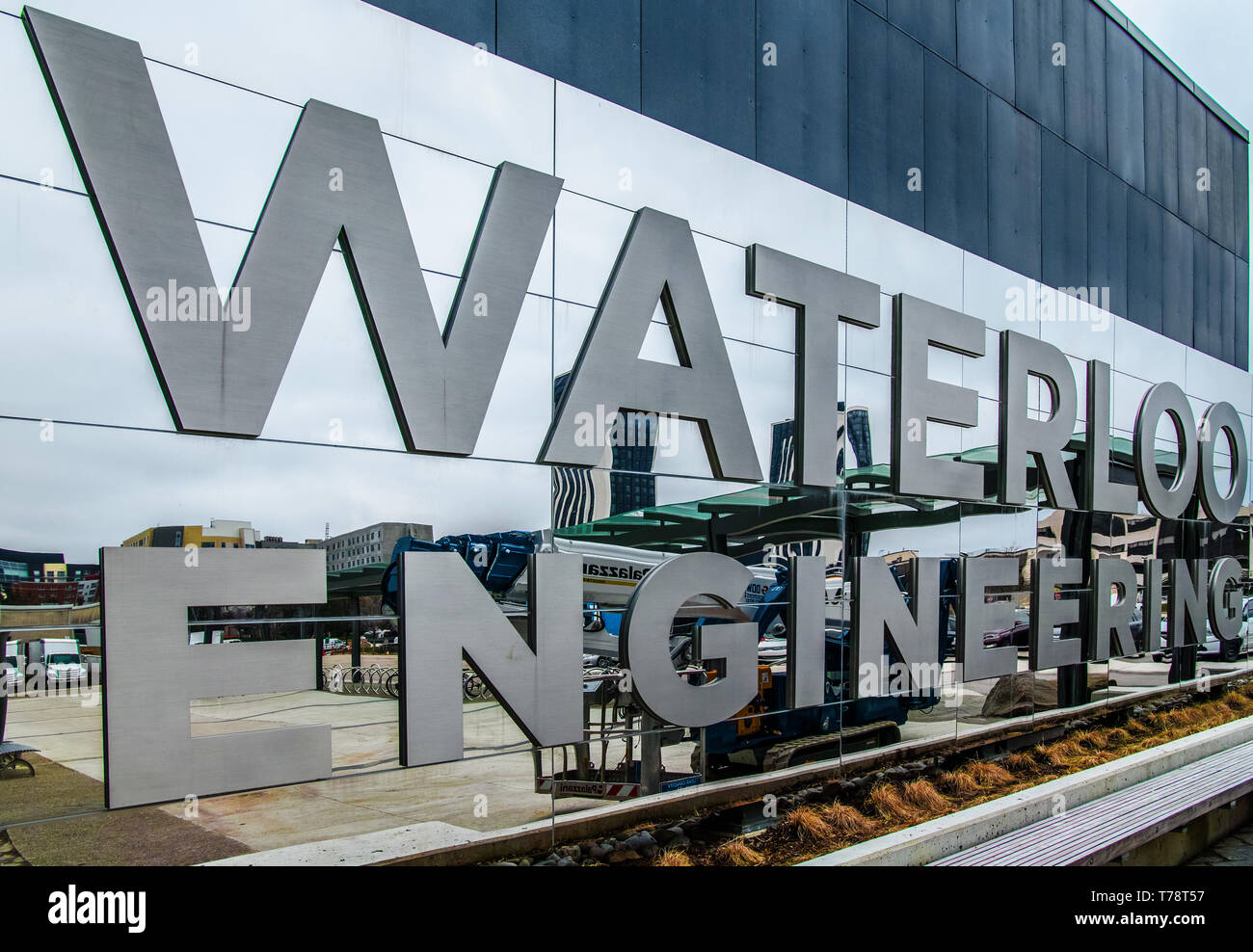 Waterloo Engineering School logo on the wall of the building. Reflexions on shiny metal. Stock Photo