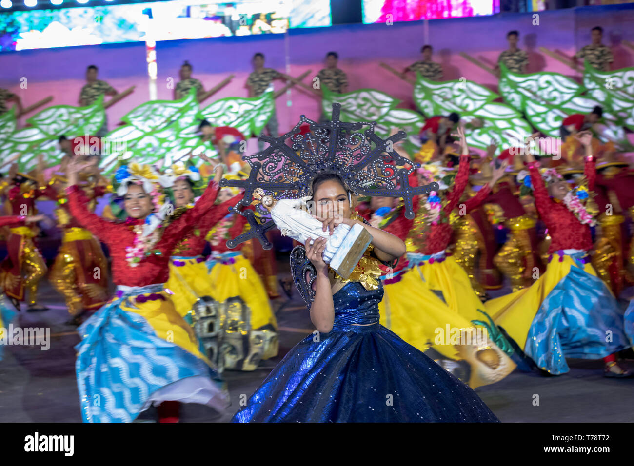 street dance festival in Philippines, brightly colored costumes and