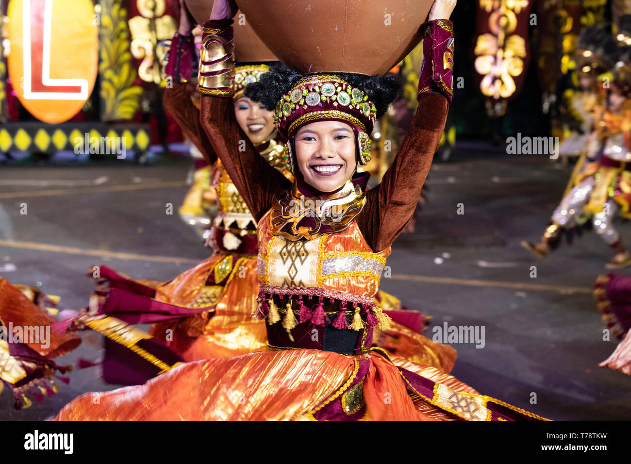 street dance festival in Philippines brightly colored costumes