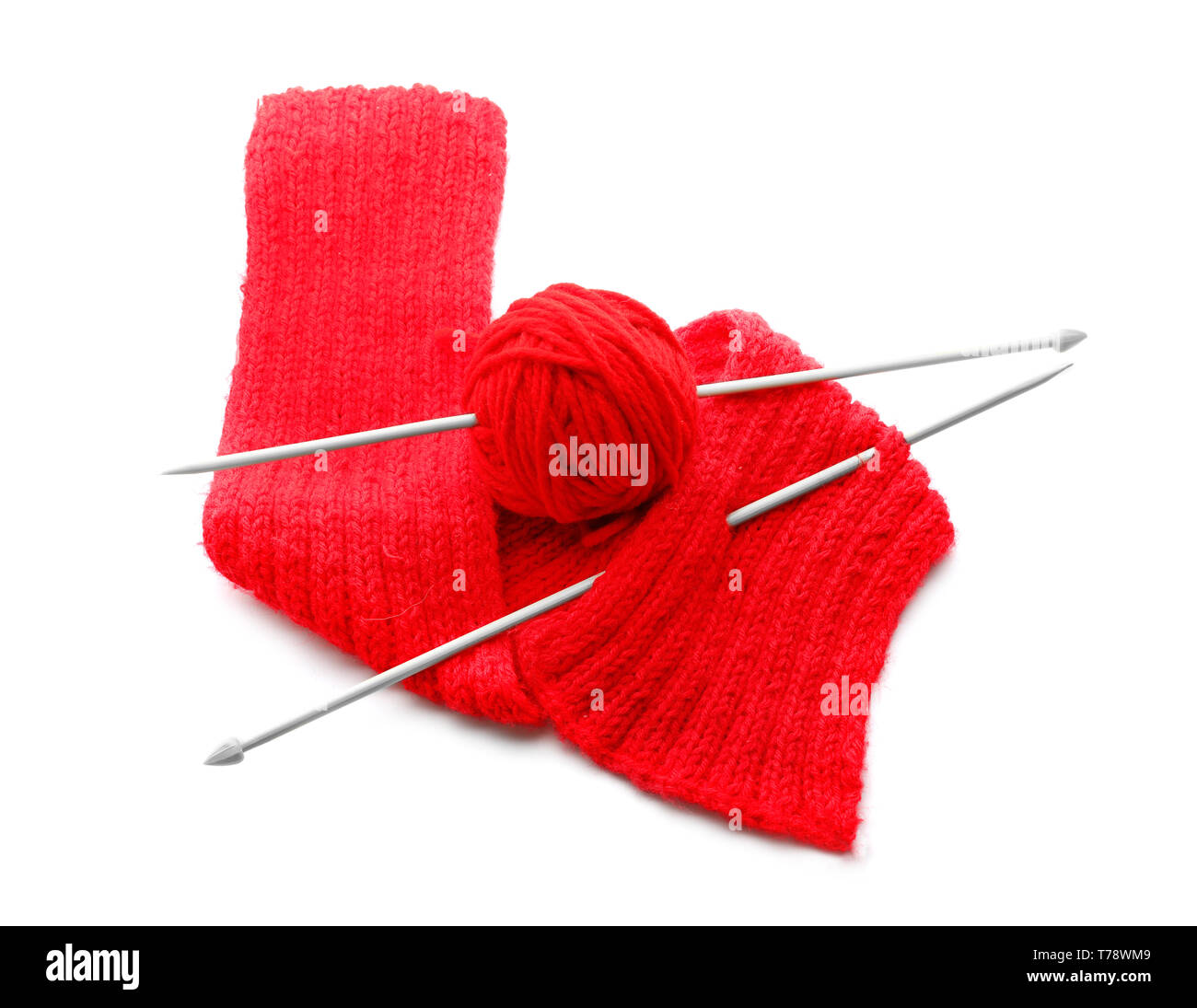 Knitting thread with scarf on white background Stock Photo - Alamy