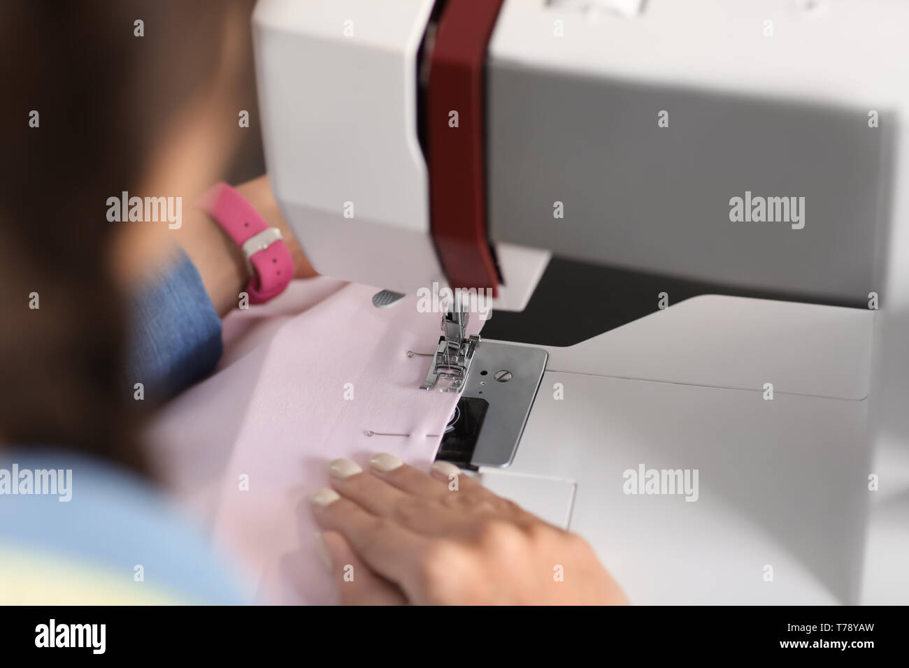 Sewing machine work closeup young hi-res stock photography and images ...