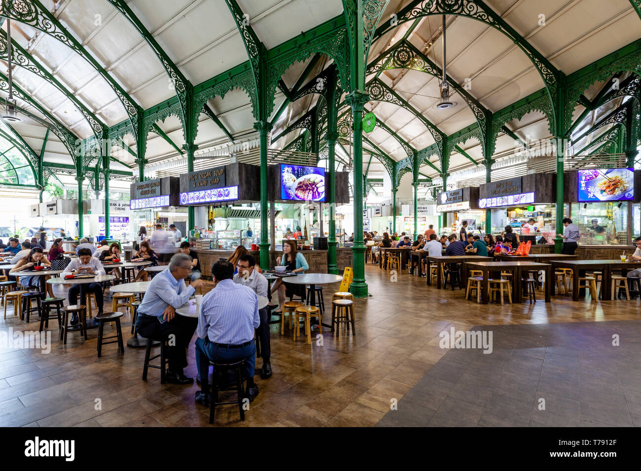 People Eating Lunchtime Food At The Lau Pa Sat Festival Market, Singapore, South East Asia Stock Photo