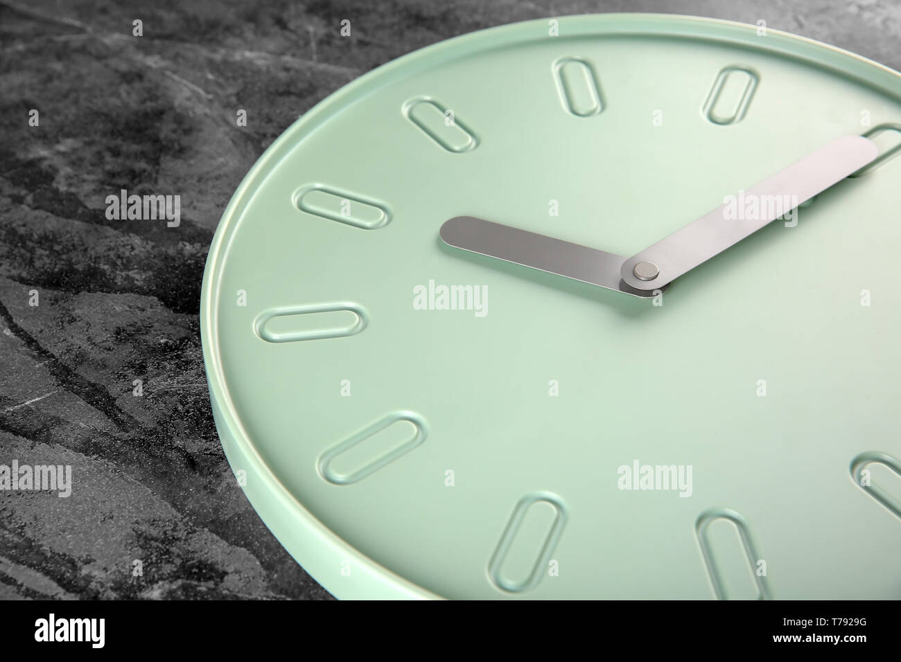 Clock on grey textured background, closeup. Time management concept ...
