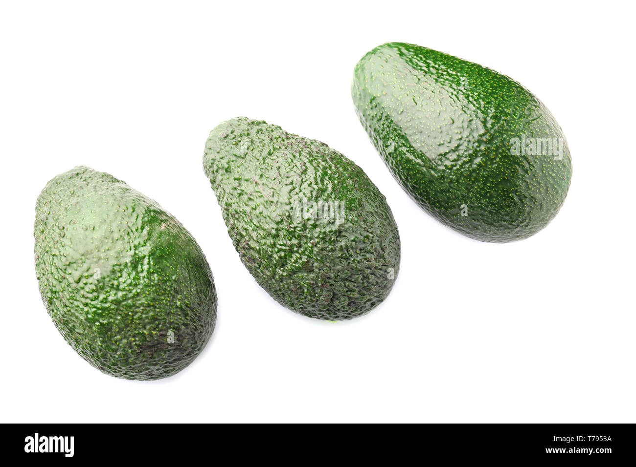 Fresh avocados on white background Stock Photo - Alamy