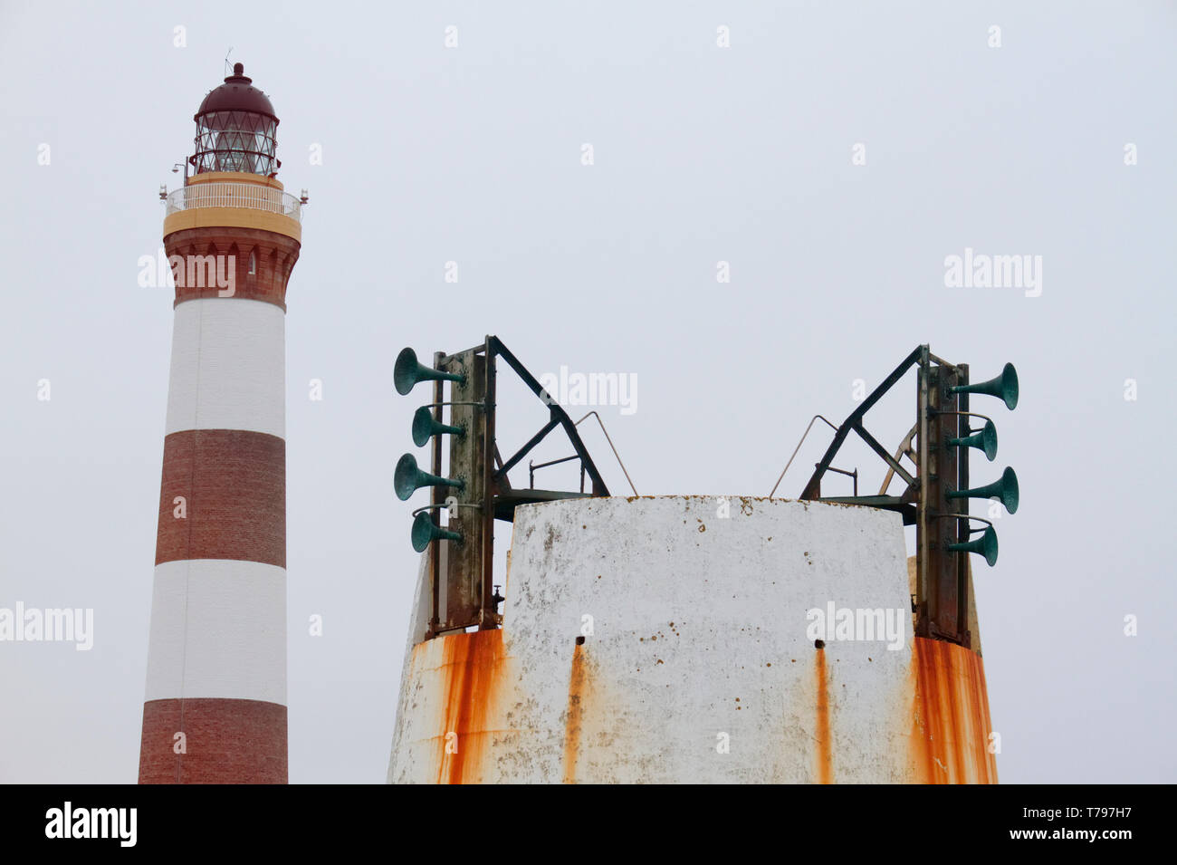 Dennis Head lighthouse and old fog horn, North Ronaldsay, Orkney Stock Photo