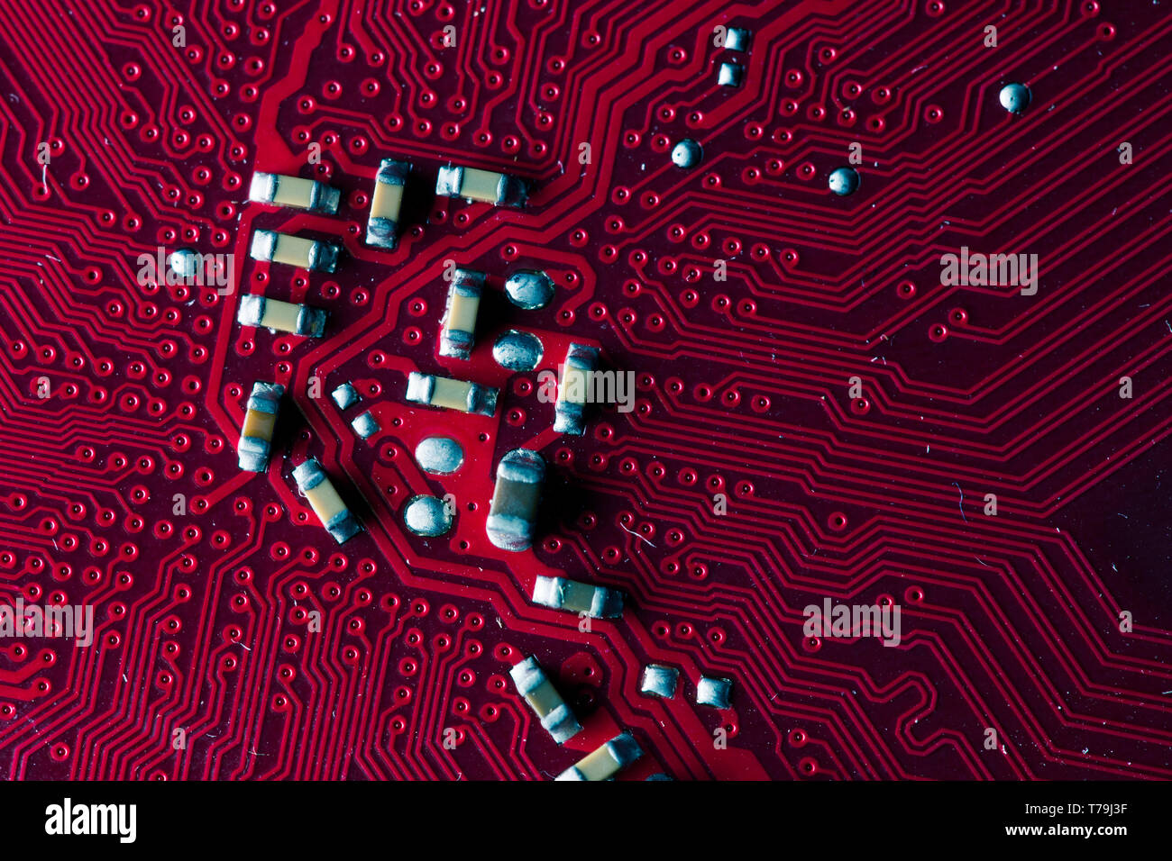 Macro picture of red printed circuit board - PCB Stock Photo
