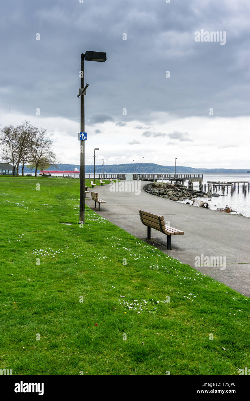 A view of decaying pilings along the shore in Ruston, Washington near ...