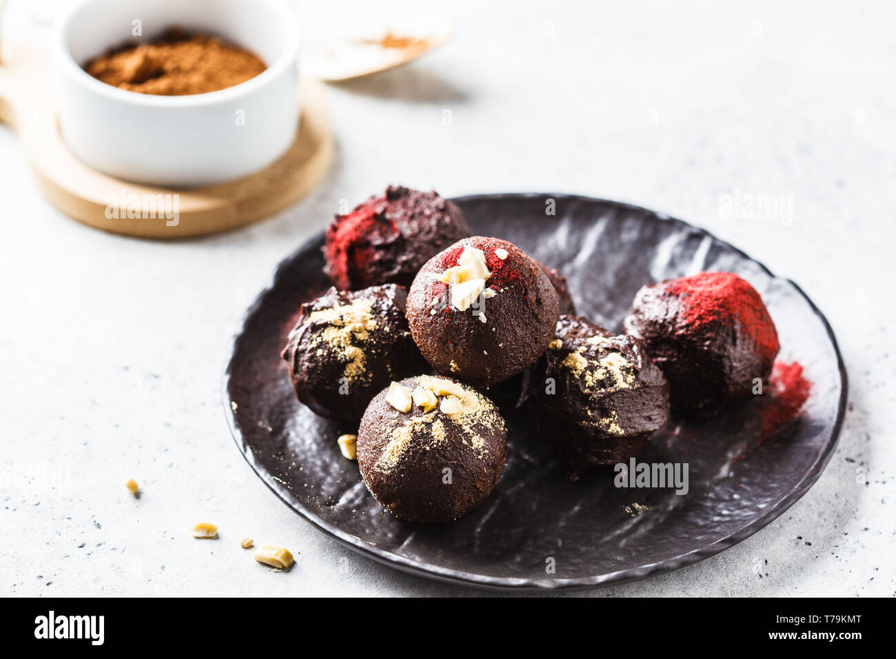 Healthy raw vegan energy balls with cocoa, dates, maca, chia on white background Stock Photo Alamy