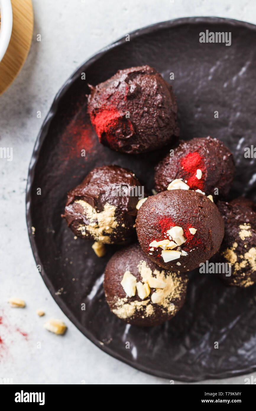 Healthy raw vegan energy balls with cocoa, dates, maca, chia on white background Stock Photo Alamy
