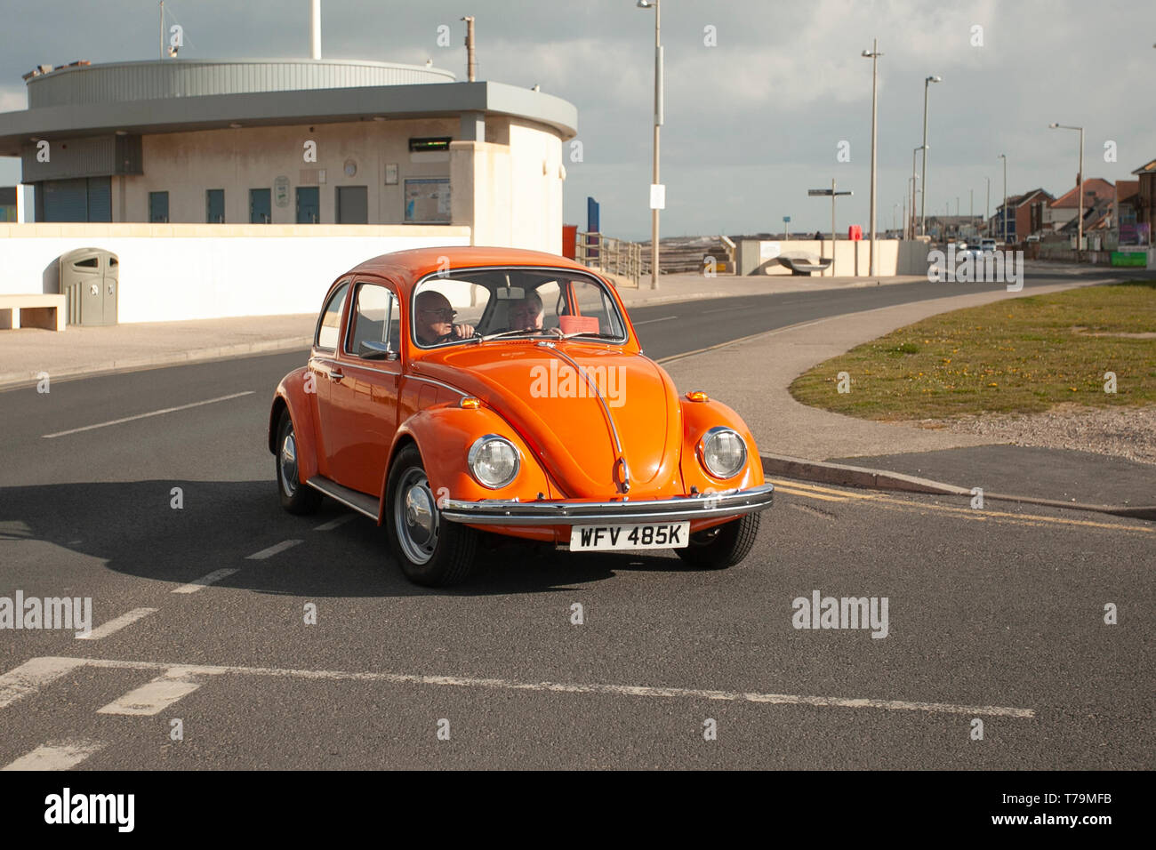 Orange 1972 70s 1300cc old style Type 1 VW Volkswagen 1300 Beetle; Classic cars at Cleveleys Spring Car Show at Jubilee Gardens in 2019. A show location for veteran, retro collectible, restored, cherished old timers, heritage event, vintage, automobile vehicle show by Blackpool Vehicle Preservation Group (BVPG). Stock Photo